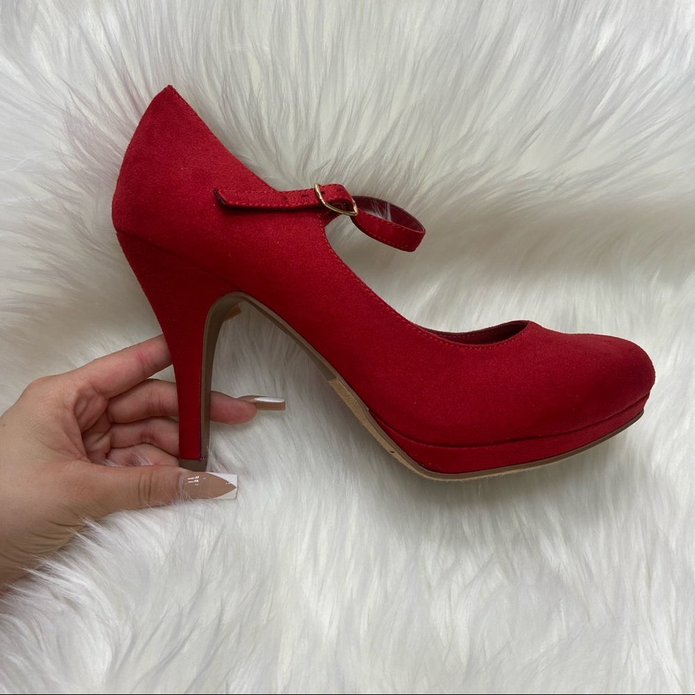 Red suede closed toe heels